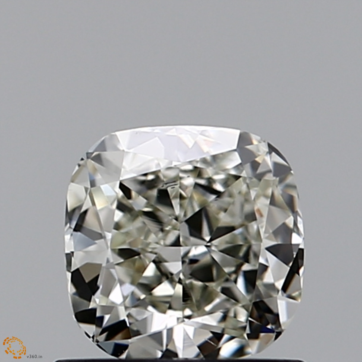 0.72-carat cushion diamond with null color, null cut, and SI1 clarity.